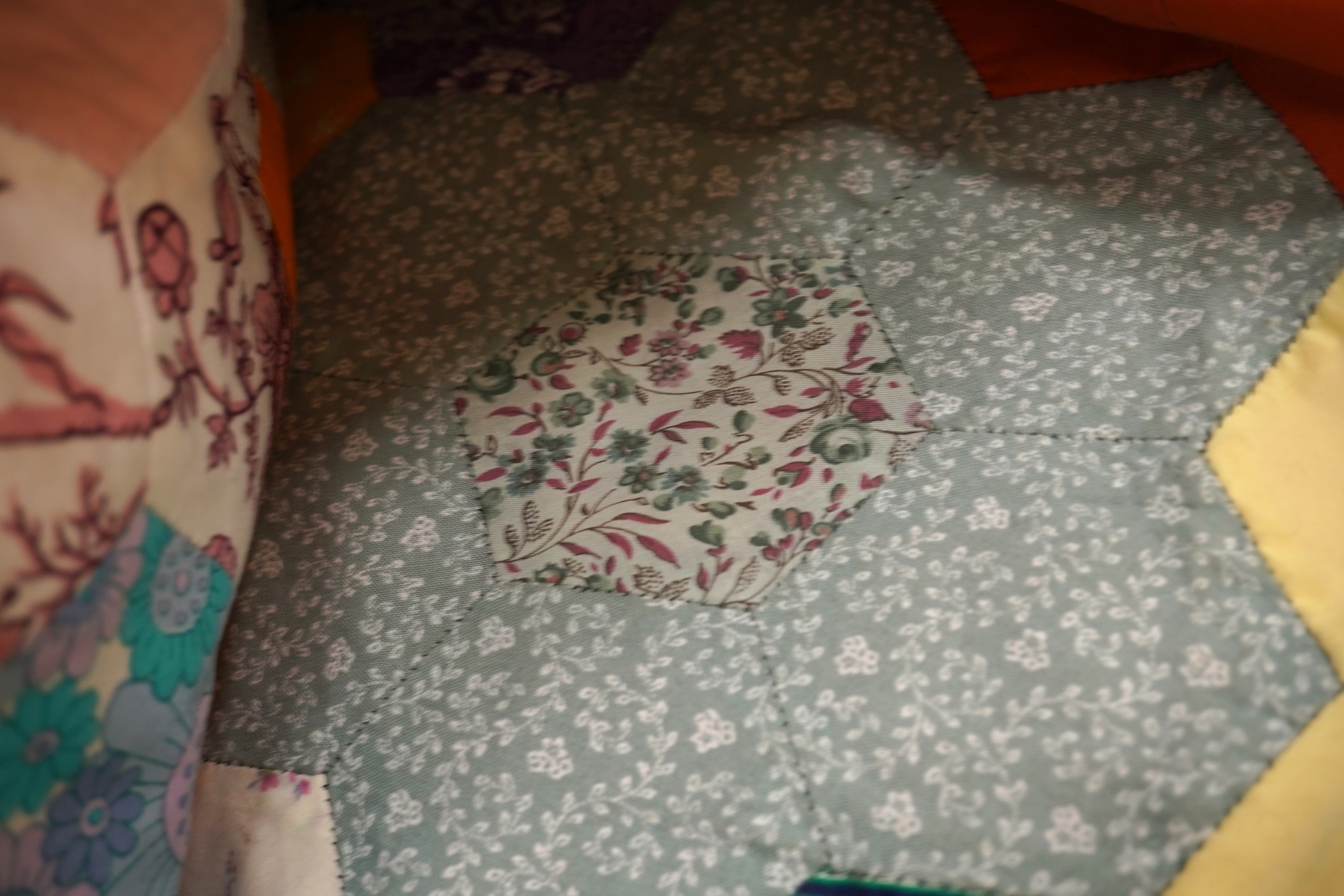 A mid 20th century patchwork quilt